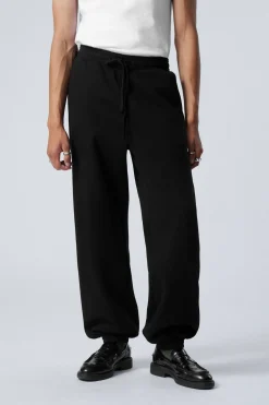 Weekday RELAXED HEAVYWEIGHT SWEATPANTS black Shop