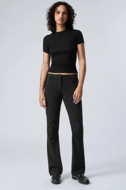 Weekday SLIM LOW WAIST FLARED PLEATED TROUSERS black Cheap